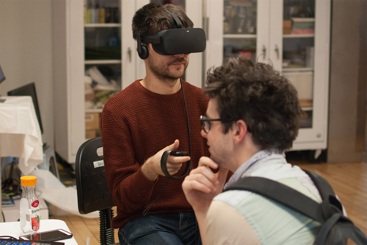 a man wearing Hololens VR headset