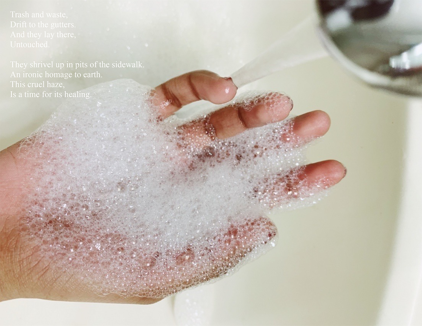 photo of hand being washed