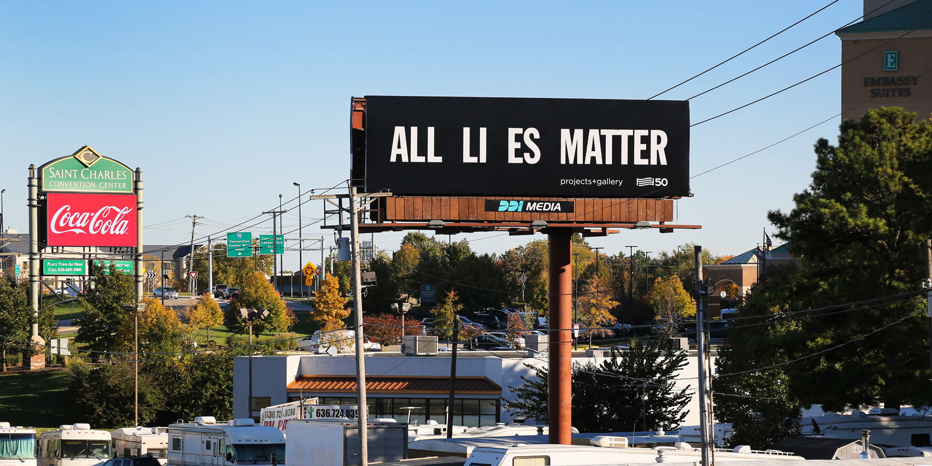 billboard in St Louis Missouri states "all li es matter" text on black background