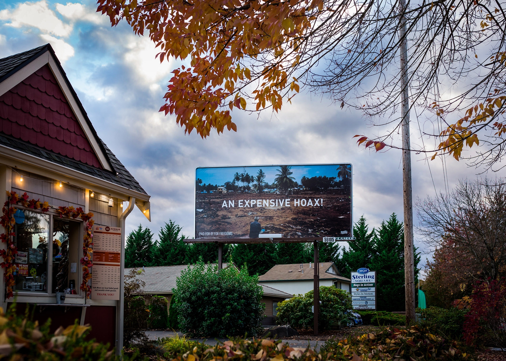 Billboard in Olympia Washington by artist Wyatt Gallery, entitled "An Expensive Hoax"
