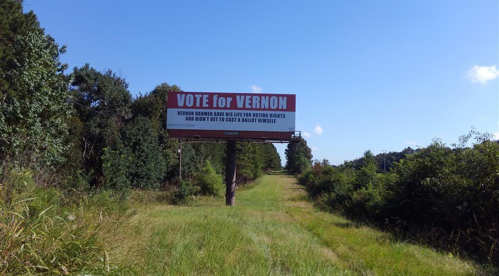 Billboard by Jessica Ingram, contains text "Vote for Vernon Dahmer", 2018