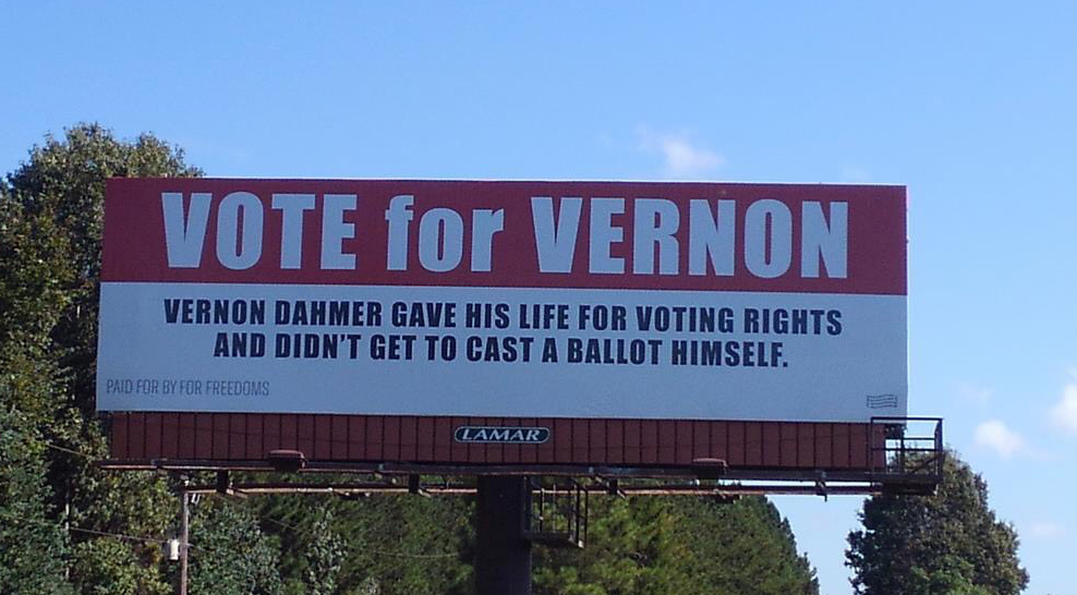 billboard by Jessica Ingram, contains text "Vote for Vernon Dahmer", 2018