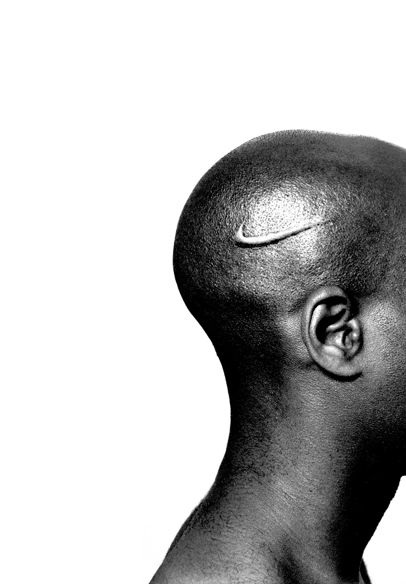 Hank Willis Thomas (American, born 1976), Branded Head, 2003, from the series Branded, Chromogenic print, Courtesy the artist and Jack Shainman Gallery, New York © Hank Willis Thomas.