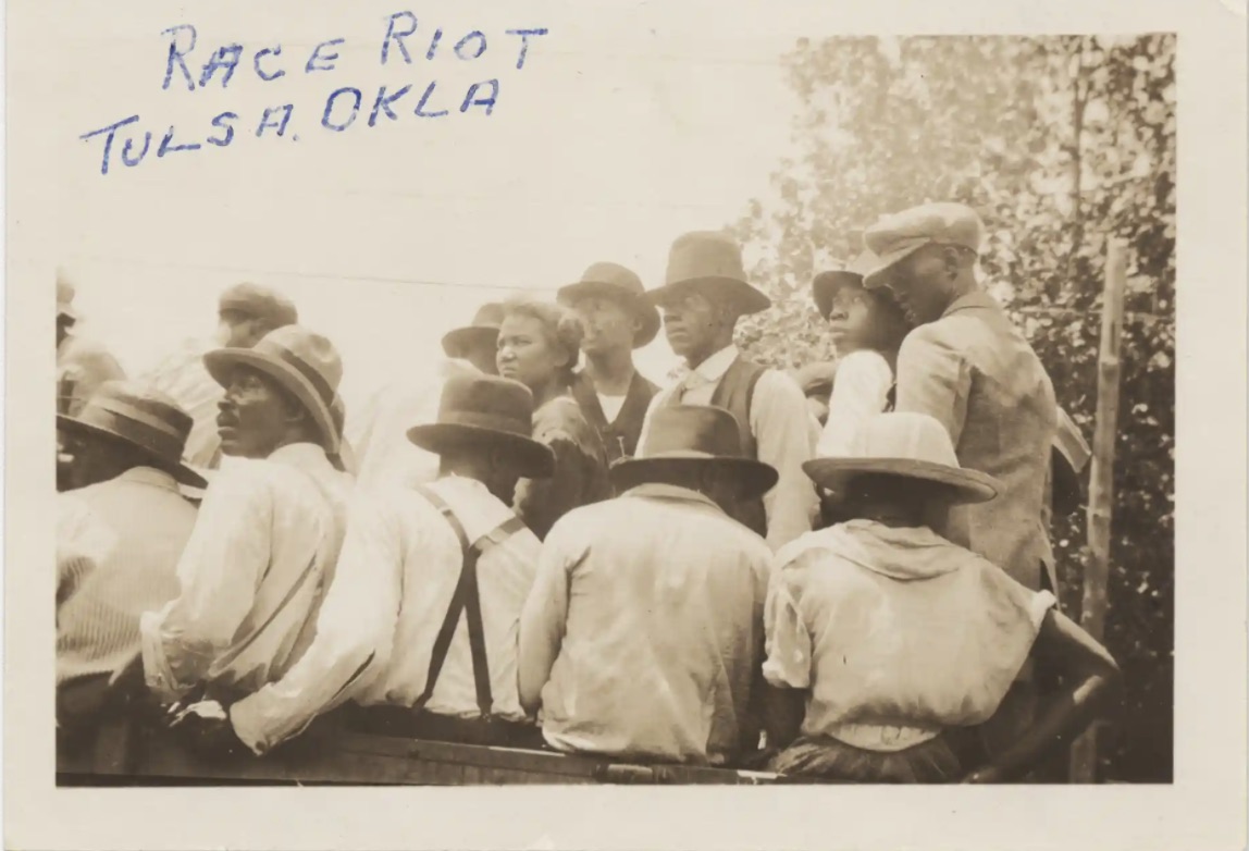 A group of black men and women displaced by the race riots in Tulsa, OK on May 31-June 1, 1921