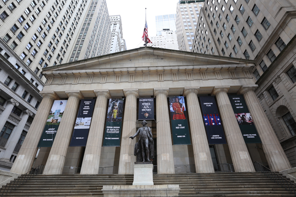 federal hall building exterior depicts photographic banner installations of the works in the exhibition