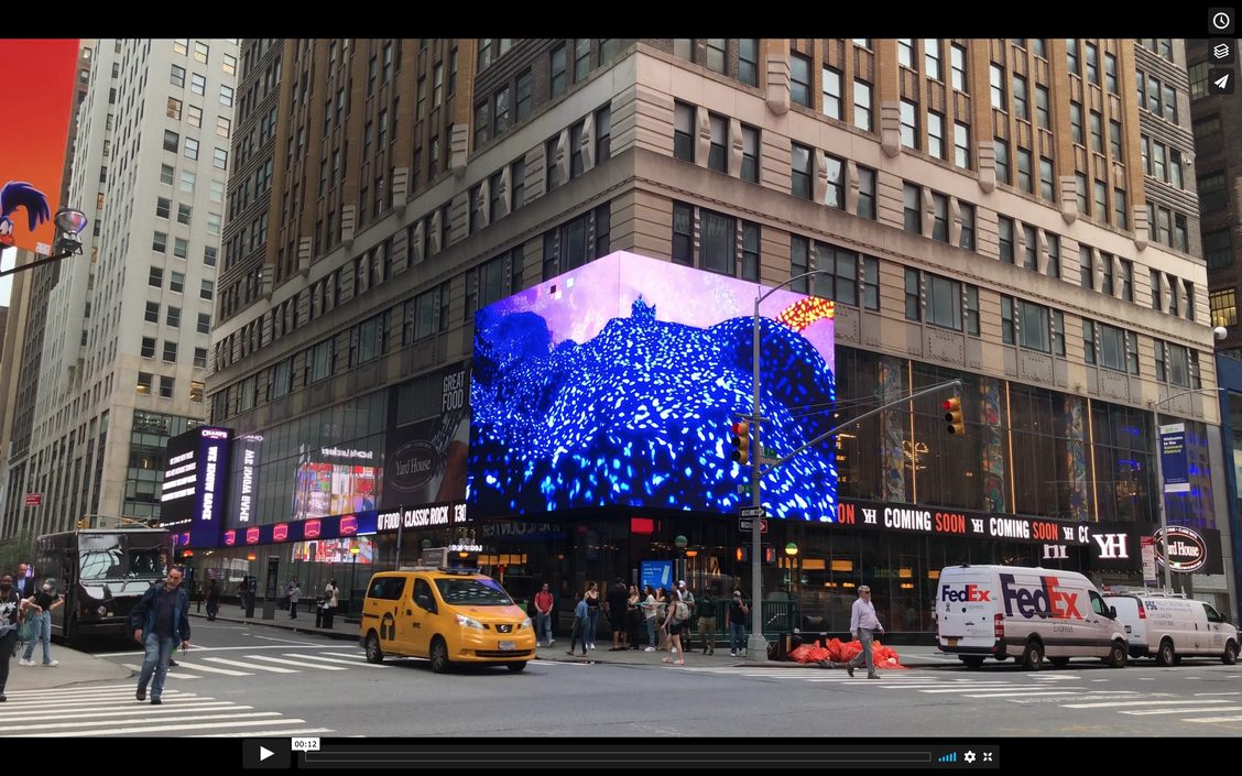 digital billboard playback of multimedia installation depicting snow and avalanche systems
