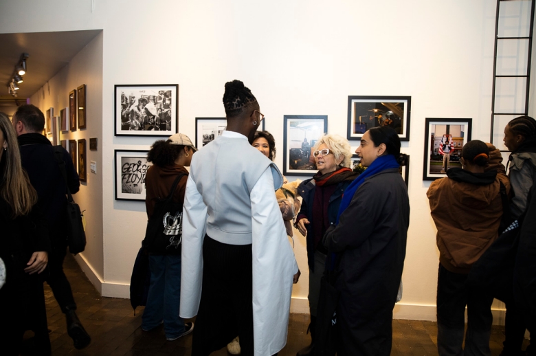 An image of attendees at the reception for the exhibition