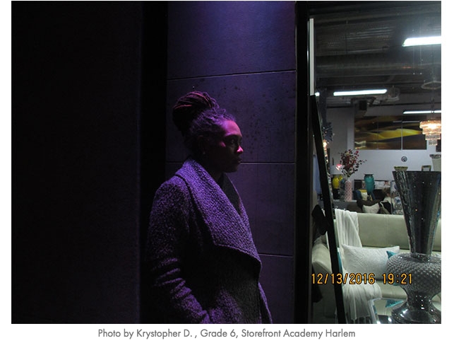 person in purple light by window. photo by krystopher d grade 6 storefront academy harlem
