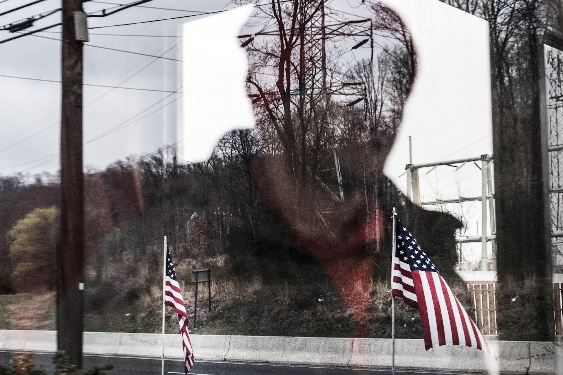 Woman's reflection in a window