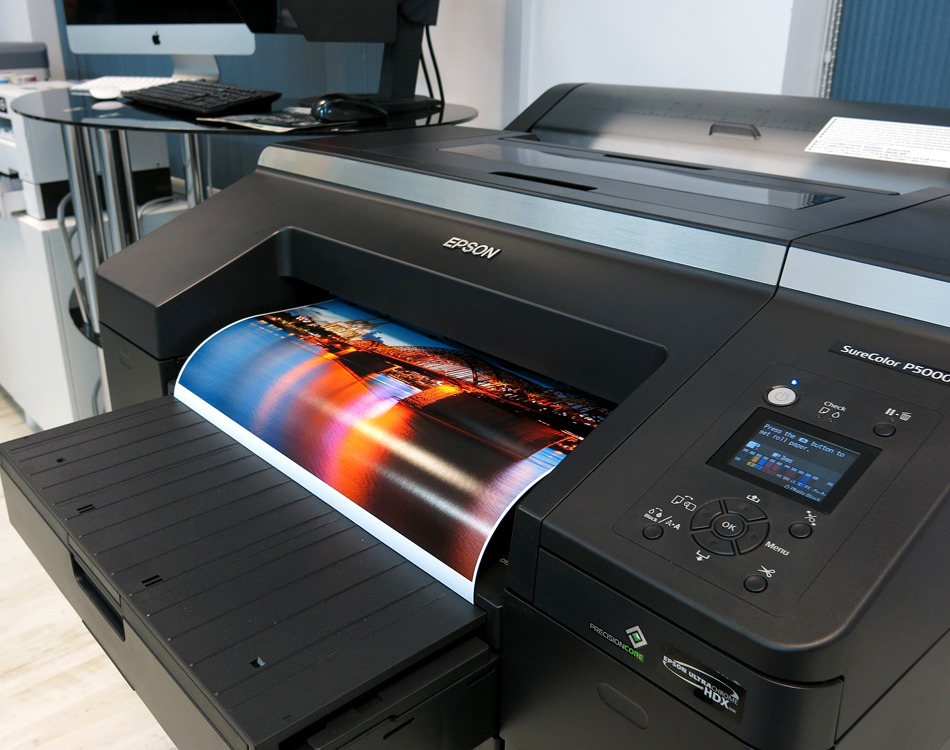 a picture of the Epson P5000 in use printing a photo