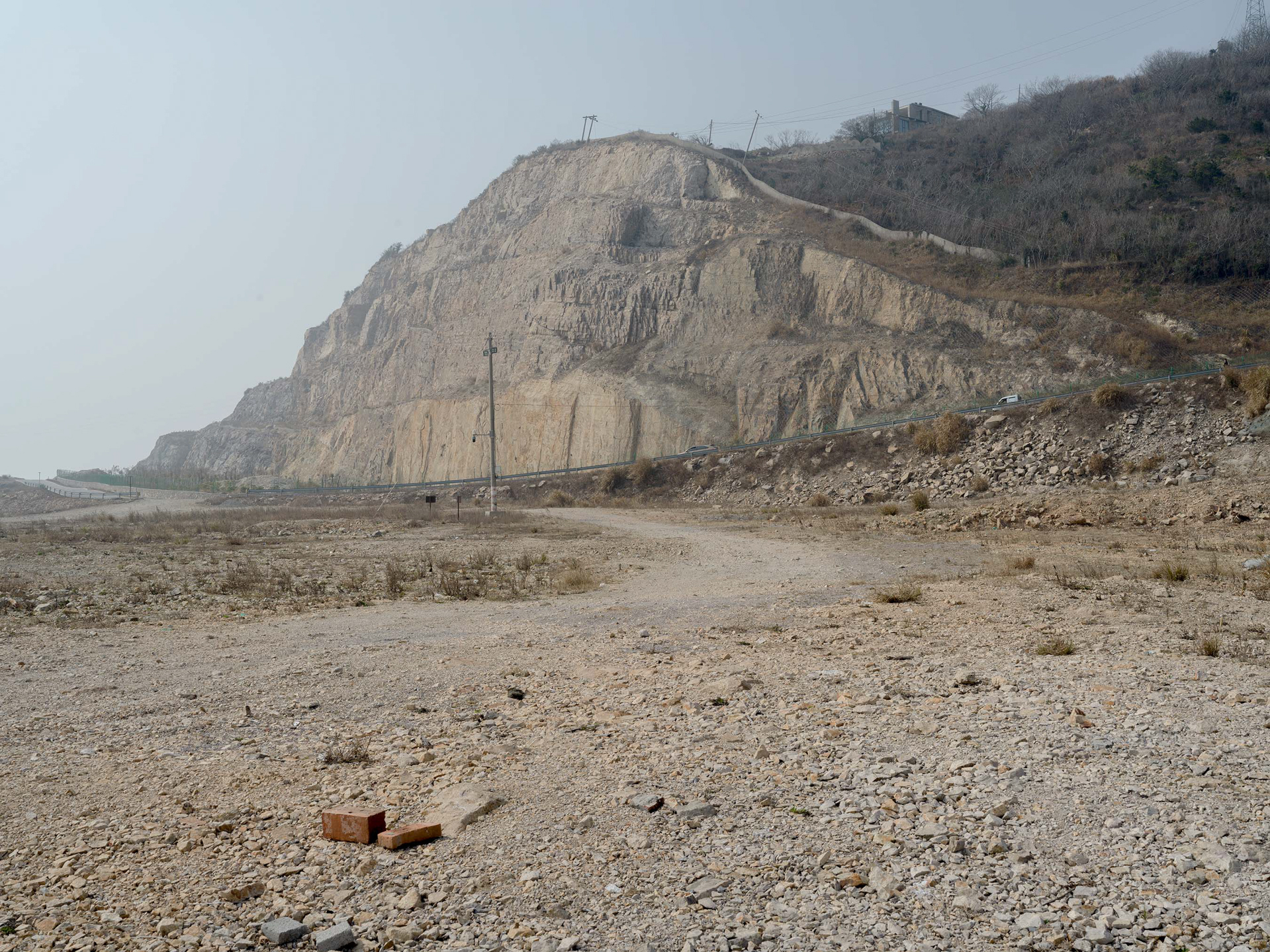 A road on the side of a cliff