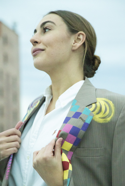 Portrait of a woman with colorful lapel on suit jacket