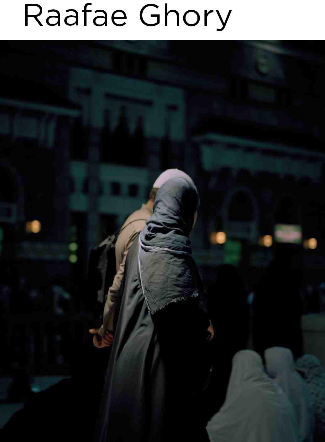 person in religious garb at night