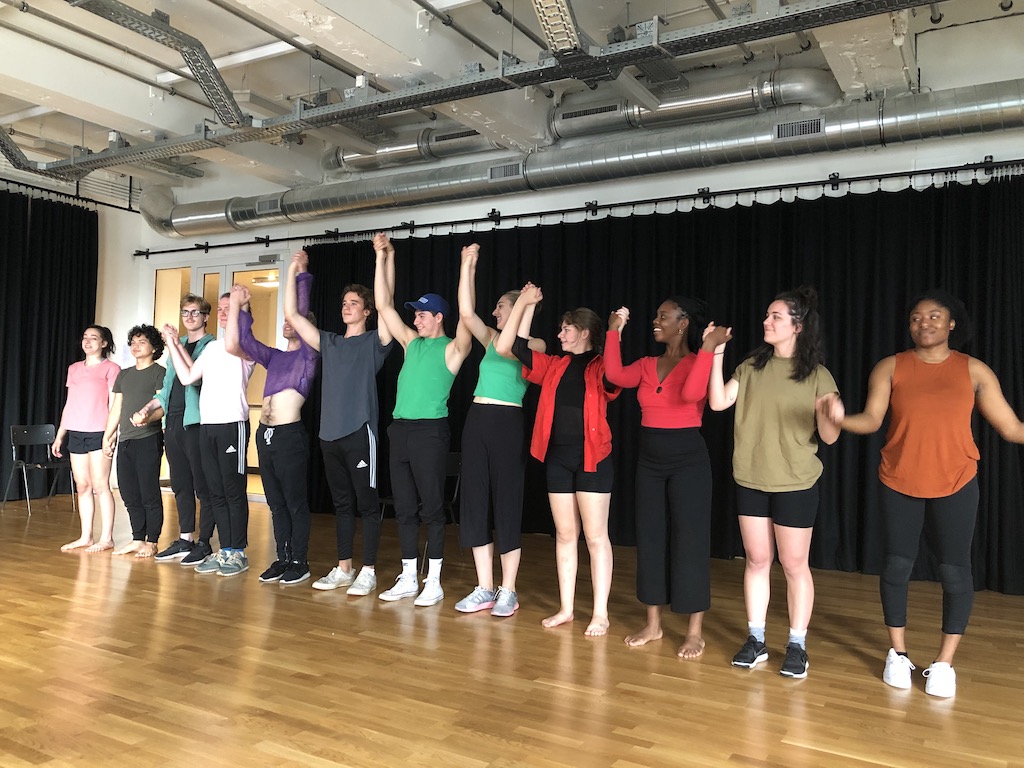 Summer 2019 International Theatre Workshop students taking a curtain call in an acting studio