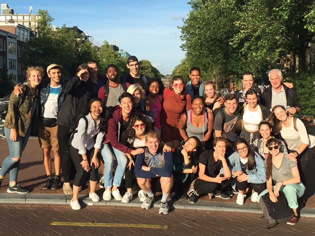 Summer 2016 International Theatre Workshop class posing outdoors in Amsterdam with Kevin Kuhlke