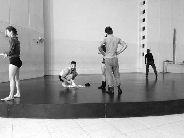 Black and white photo of dancers in a studio.