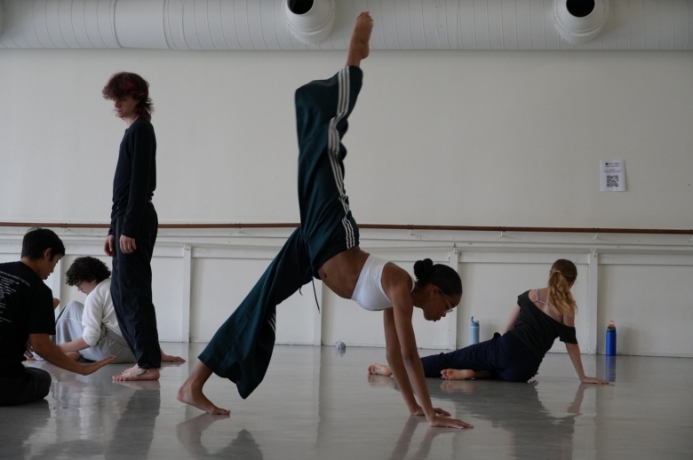 Group of dance students training in a rehearsal studio