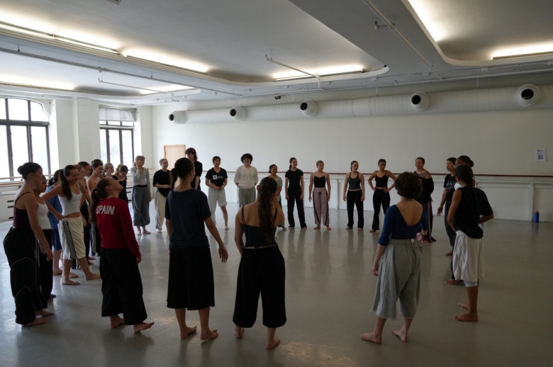 Dance students in mid-practice during a dance class