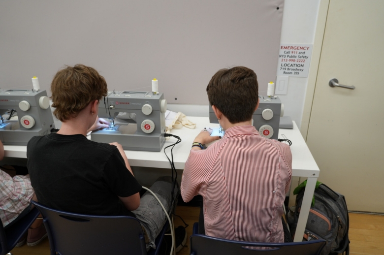 Students being instructed during the production and design class