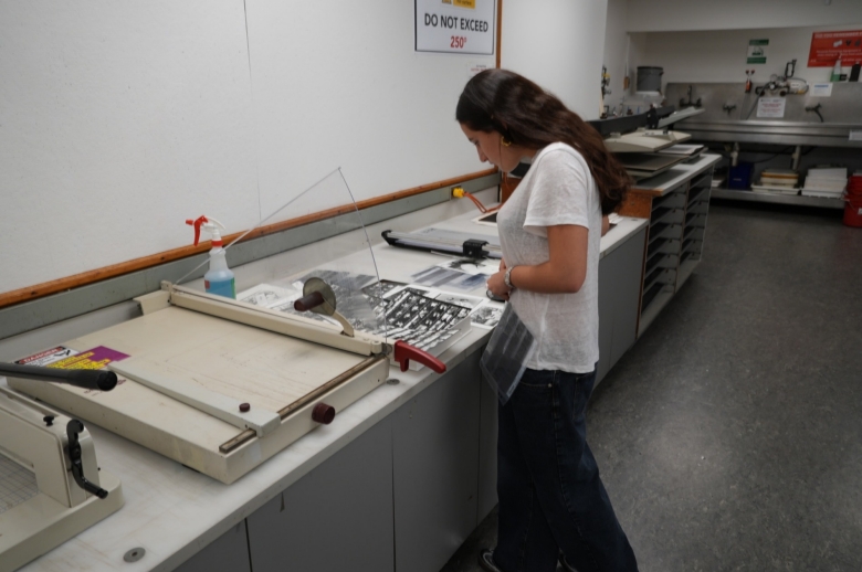 A Tisch Summer High School Photography student working on images 