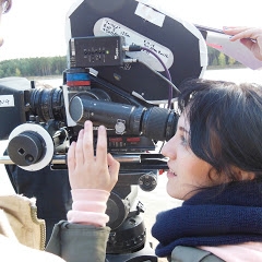 Image of a student using a film camera.