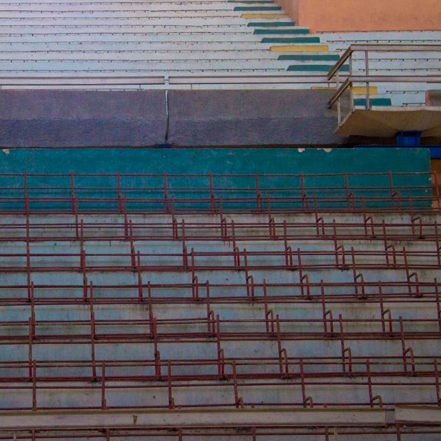 Empty bleachers in a Cuban soccer stadium.