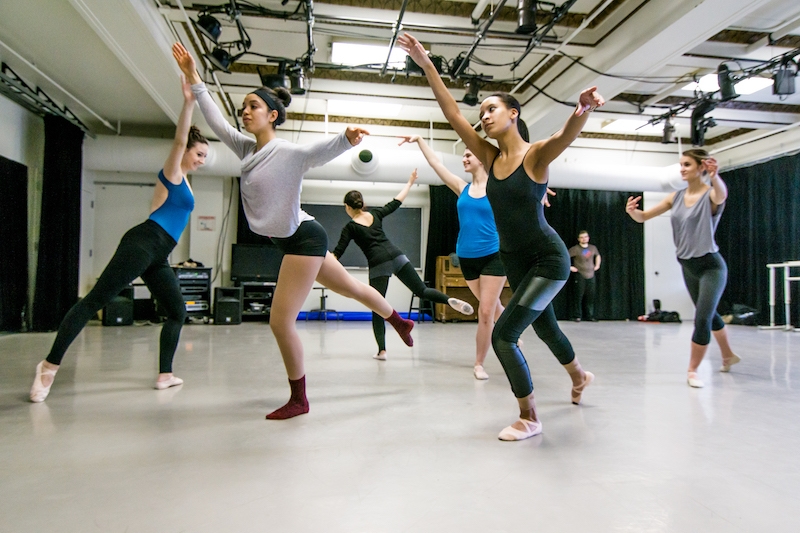 Students training in a dance studio.