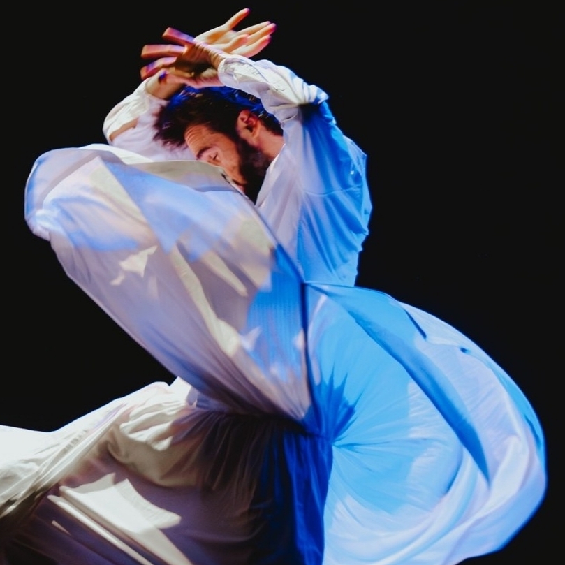Photo of Pau Aran, mid-movement on stage