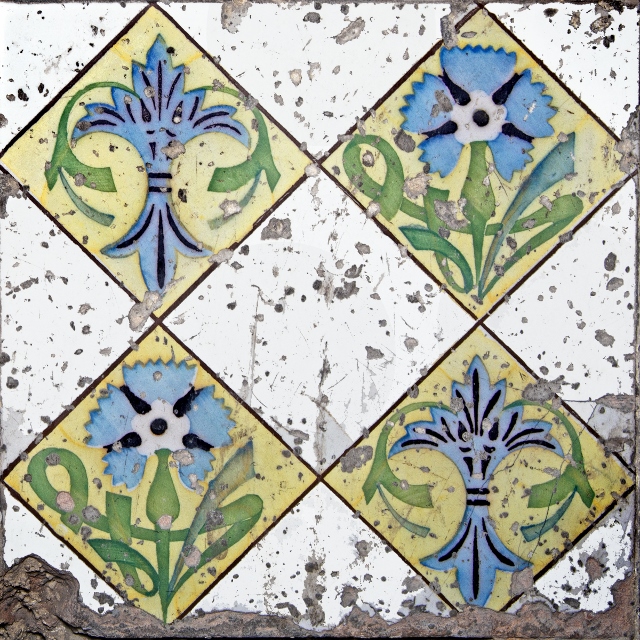 Yellow, blue, and white diamond-shaped ceramic tiles in Havana.