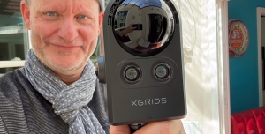 Instructor, Noah Kadner holding a 3D scanner