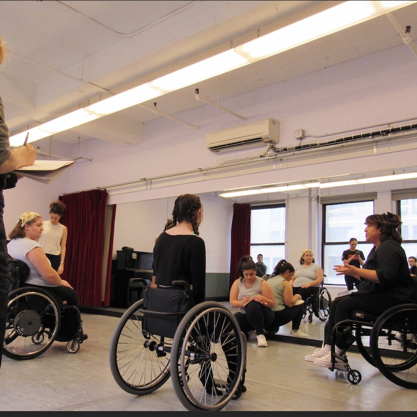 People talking at a former Creative Adaptations workshop